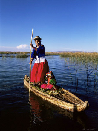 Uros Indian Woman and Traditional Reed Boat, Islas Flotantes, Lake Titicaca, Peru, South America